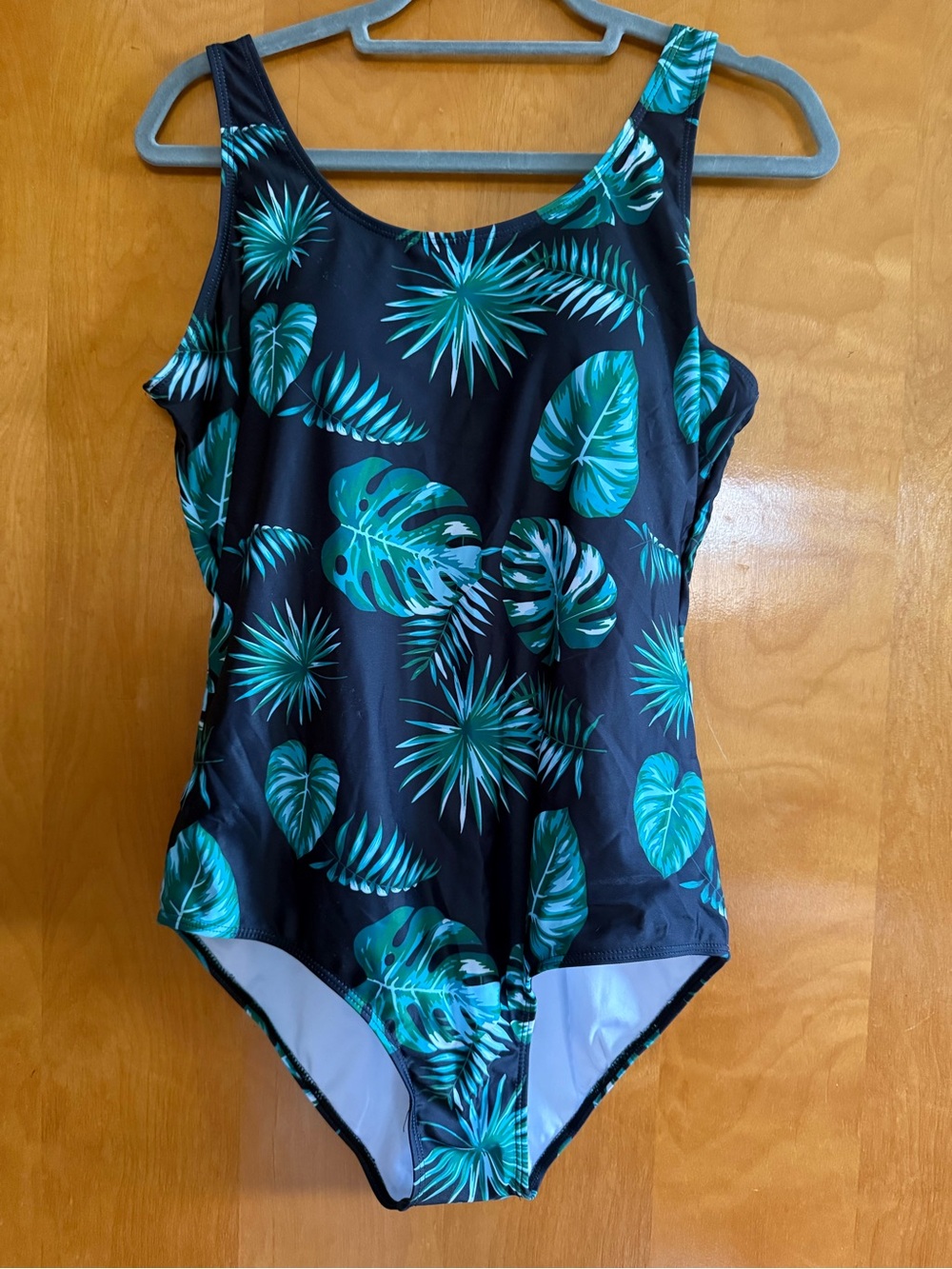 Tropical leaf one piece swimsuit crisscross back padded NWOT - washed, not worn